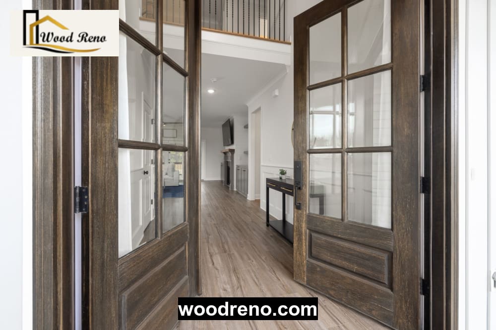 Finished wooden entrance door with metal handle and lock