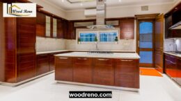 Modern kitchen with aluminium-framed and wood-finish cabinets